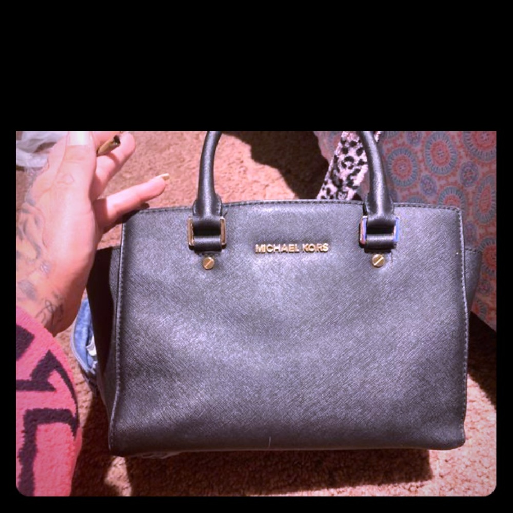 Barley used Michael Kors purse